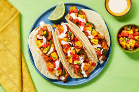Bright mango taco with tuna